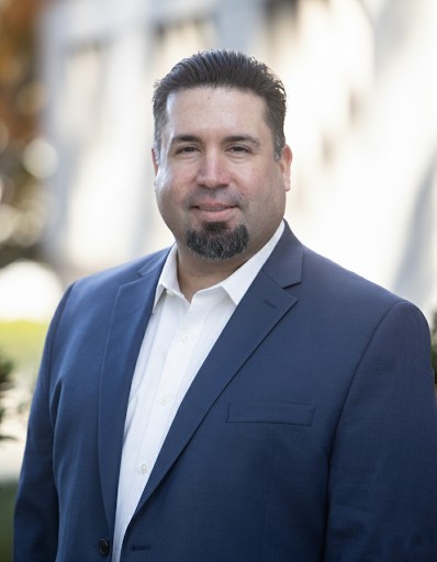 Headshot of Ezra Mann, EVP of Court Reporting